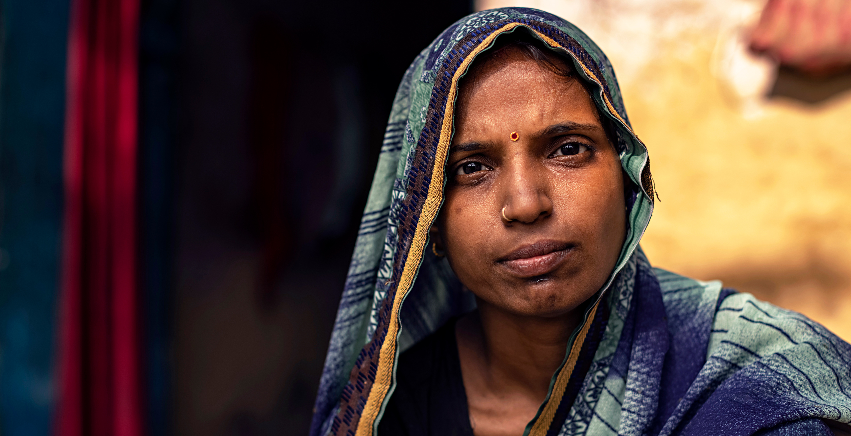 Woman smiling outside in the sun